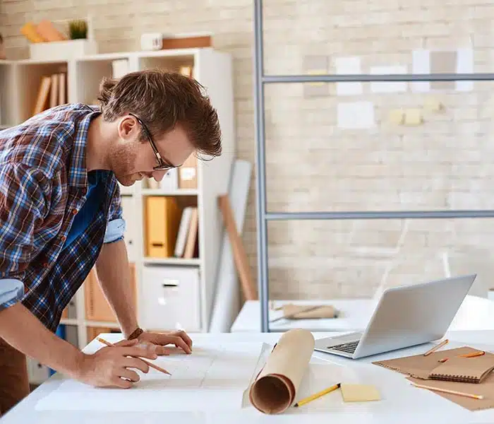 Architect Near Me: 8TFive Studio - Stock Image Reviewing Drawings